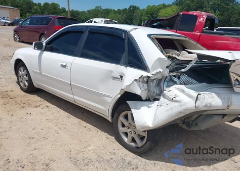 2000 Toyota Avalon Xls z USA, uszkodzony, nr VIN 4T1BF28B2YU095637
